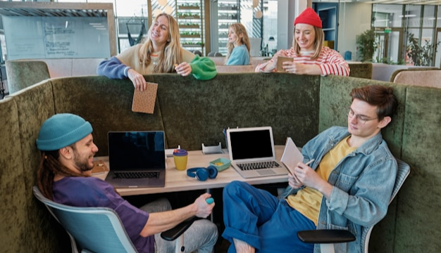 HR team discussing employee policies and internal culture in a casual workspace